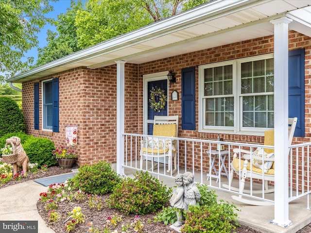 2807 Carlisle Dr Unit 29, New Windsor, MD 21776 - property entrance featuring brick siding and a porch