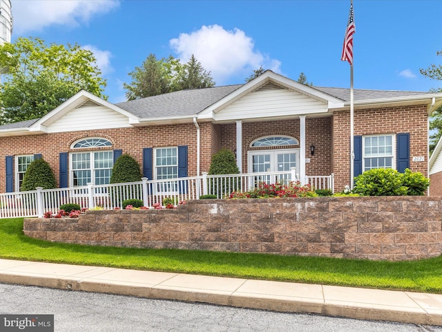 2807 Carlisle Dr Unit 29, New Windsor, MD 21776 - view of front of house featuring covered porch and brick siding