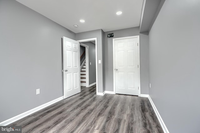 1940 W N Ave, Baltimore, MD 21217 - unfurnished bedroom featuring wood finished floors, baseboards, and recessed lighting