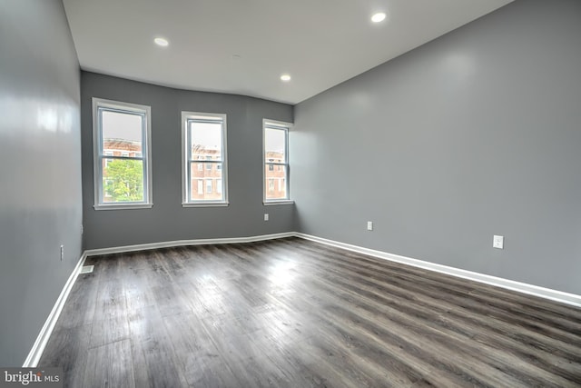 1940 W N Ave, Baltimore, MD 21217 - empty room with dark wood finished floors, baseboards, and recessed lighting