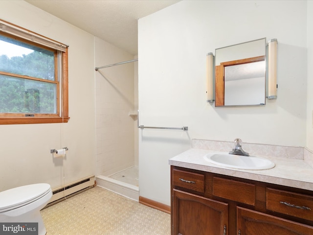 717 W Locust St, Woodstock, VA 22664 - full bathroom featuring baseboard heating, a tile shower, vanity, and toilet