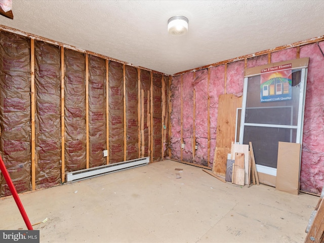 717 W Locust St, Woodstock, VA 22664 - basement with a baseboard radiator and a textured ceiling