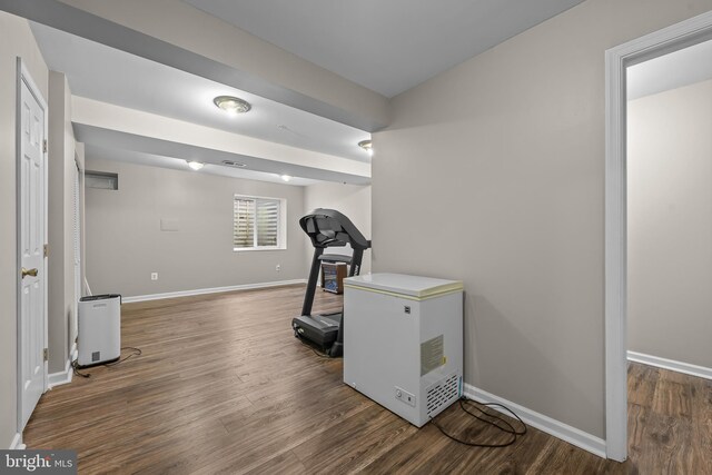 273 Thomas Harmon Dr, Camden Wyoming, DE 19934 - exercise area featuring wood finished floors and baseboards