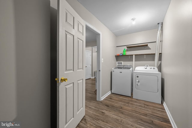 273 Thomas Harmon Dr, Camden Wyoming, DE 19934 - laundry area with washer and clothes dryer, baseboards, and dark wood-style floors