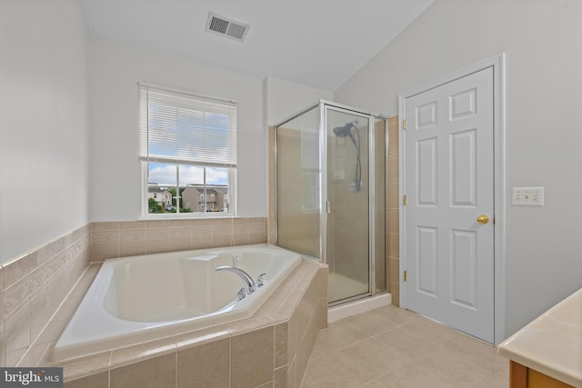273 Thomas Harmon Dr, Camden Wyoming, DE 19934 - full bathroom featuring a garden tub, a shower stall, vanity, and tile patterned floors