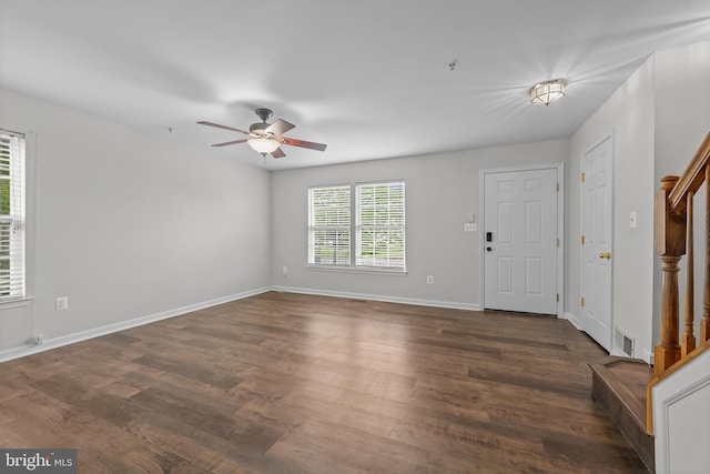 273 Thomas Harmon Dr, Camden Wyoming, DE 19934 - foyer entrance with ceiling fan, stairway, dark wood finished floors, and baseboards