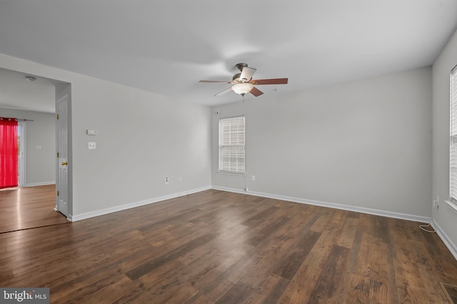 273 Thomas Harmon Dr, Camden Wyoming, DE 19934 - spare room with ceiling fan, dark wood-style flooring, healthy amount of natural light, and baseboards