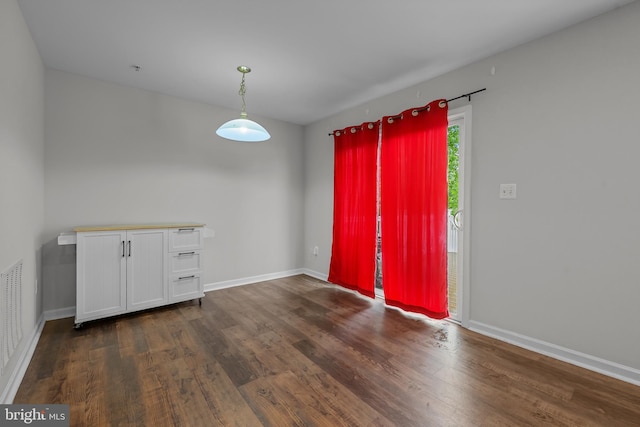 273 Thomas Harmon Dr, Camden Wyoming, DE 19934 - empty room featuring dark wood-style floors and baseboards