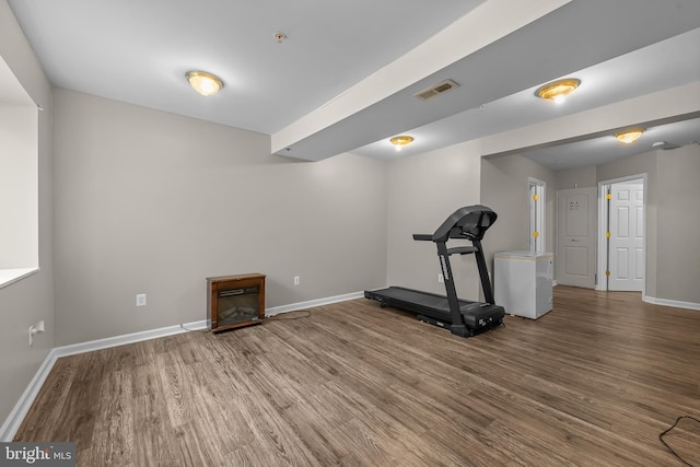 273 Thomas Harmon Dr, Camden Wyoming, DE 19934 - workout area featuring wood finished floors and baseboards
