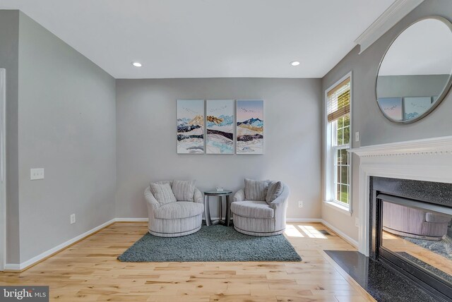 9 Cherry Ct, Lafayette Hill, PA 19444 - sitting room featuring wood finished floors, baseboards, a fireplace with flush hearth, and recessed lighting