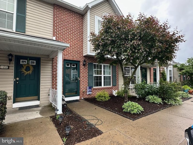 106 Pebble Ln, Bellefonte, PA 16823 - entrance to property with brick siding