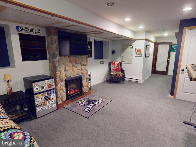 106 Pebble Ln, Bellefonte, PA 16823 - living room featuring a baseboard heating unit, carpet floors, recessed lighting, a stone fireplace, and baseboards
