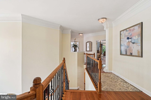 20369 Stillhouse Branch Pl, Sterling, VA 20165 - hall featuring an upstairs landing, wood finished floors, ornamental molding, and baseboards