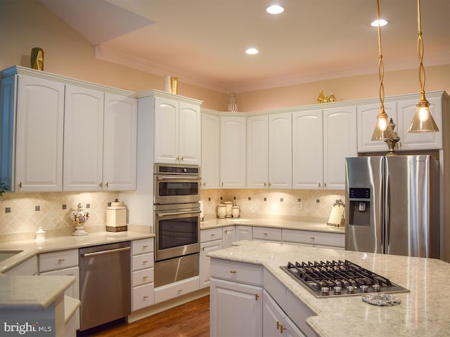 20369 Stillhouse Branch Pl, Sterling, VA 20165 - kitchen with stainless steel appliances, a warming drawer, white cabinets, backsplash, and crown molding