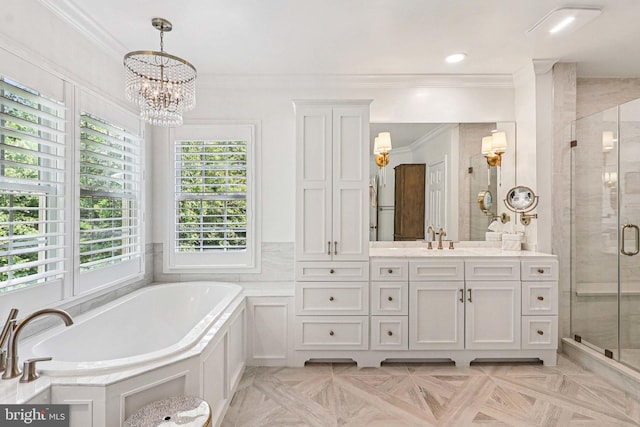 20369 Stillhouse Branch Pl, Sterling, VA 20165 - full bath featuring crown molding, vanity, a stall shower, a garden tub, and a chandelier