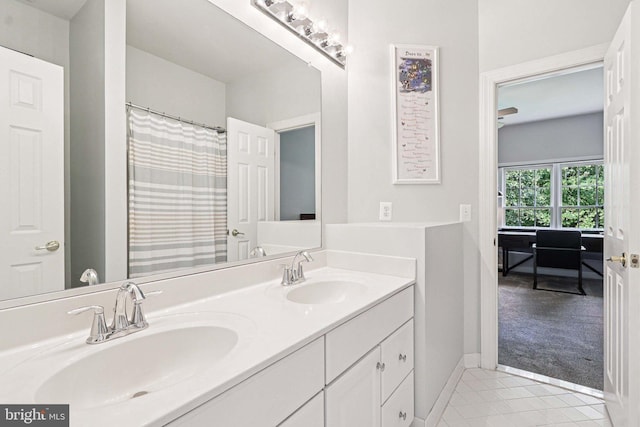 20369 Stillhouse Branch Pl, Sterling, VA 20165 - full bathroom featuring tile patterned flooring, double vanity, and baseboards