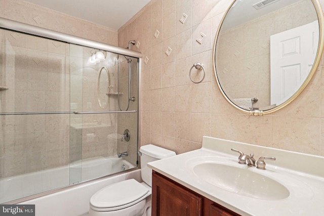 20369 Stillhouse Branch Pl, Sterling, VA 20165 - full bath featuring tile walls, toilet, vanity, and combined bath / shower with glass door