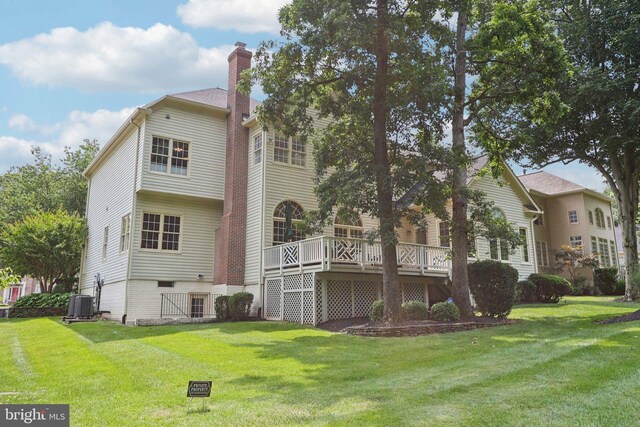 20369 Stillhouse Branch Pl, Sterling, VA 20165 - rear view of property featuring a lawn, a deck, and a chimney