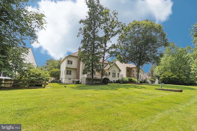 20369 Stillhouse Branch Pl, Sterling, VA 20165 - back of property with a lawn and stucco siding
