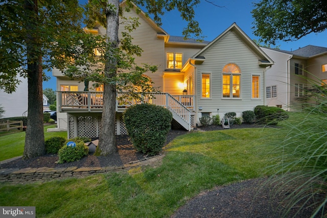 20369 Stillhouse Branch Pl, Sterling, VA 20165 - back of property with a lawn, a deck, and stairway