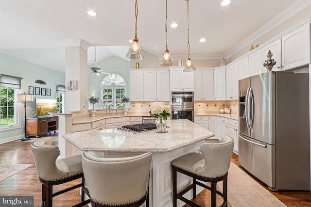 20369 Stillhouse Branch Pl, Sterling, VA 20165 - kitchen featuring stainless steel appliances, plenty of natural light, a kitchen island, white cabinets, and recessed lighting