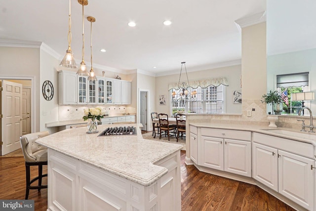 20369 Stillhouse Branch Pl, Sterling, VA 20165 - kitchen featuring a sink, stainless steel gas stovetop, tasteful backsplash, recessed lighting, and glass insert cabinets
