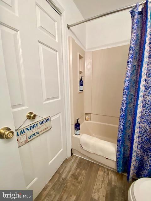 3605 Haley Ct, Wilmington, DE 19808 - bathroom with wood finished floors, shower / tub combo with curtain, and toilet