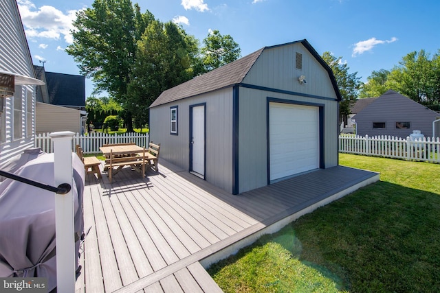 714 Alliance St, Havre De Grace, MD 21078 - deck featuring outdoor dining area, an outbuilding, and a garage