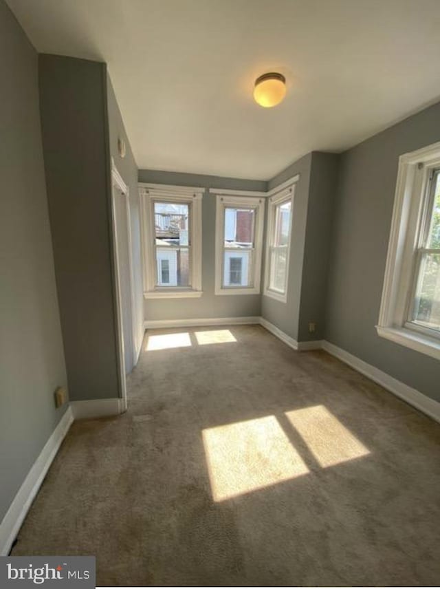 4216 Wyalusing Ave, Philadelphia, PA 19104 - spare room featuring carpet floors and baseboards