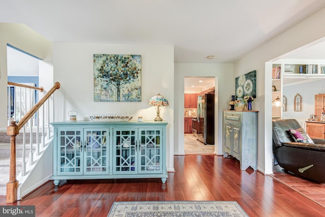 208 E Bradford Ct, Middletown, DE 19709 - corridor featuring wood finished floors, stairs, and baseboards