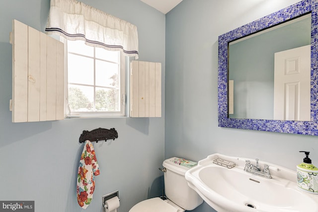 208 E Bradford Ct, Middletown, DE 19709 - bathroom featuring a sink and toilet