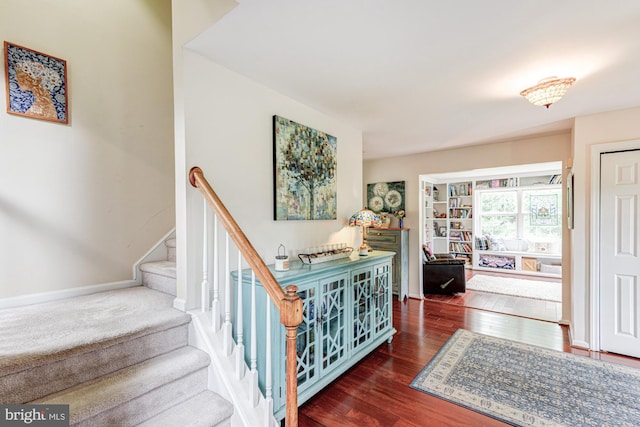 208 E Bradford Ct, Middletown, DE 19709 - staircase with wood finished floors and baseboards