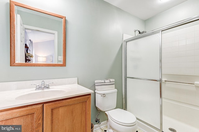 208 E Bradford Ct, Middletown, DE 19709 - full bath featuring a shower with shower door, vanity, and toilet