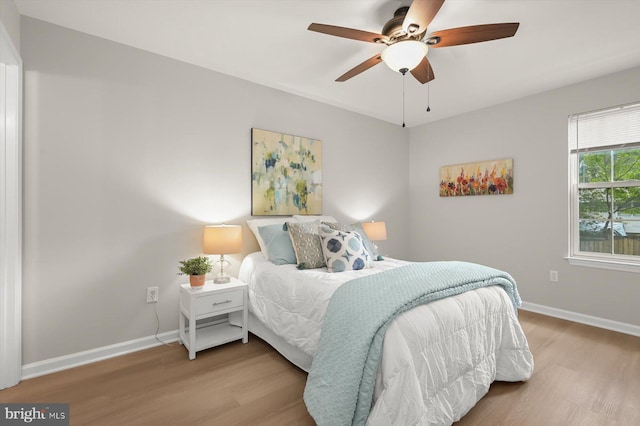 808 Pasadena Ave, Severna Park, MD 21146 - bedroom with wood finished floors, baseboards, and ceiling fan