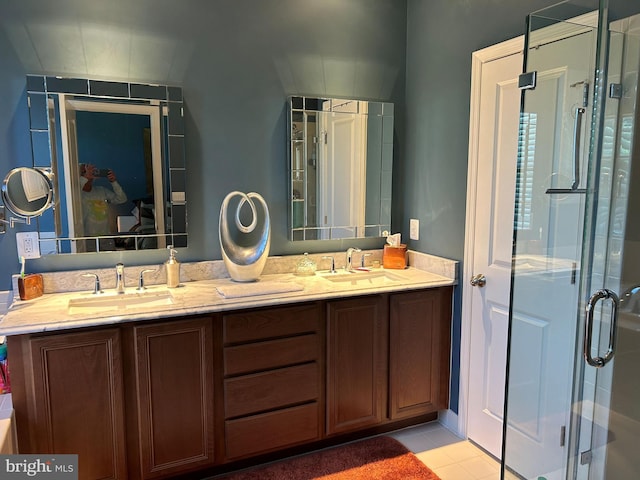 23294 Evening Primrose Sq, Brambleton, VA 20148 - full bath featuring double vanity, a stall shower, and tile patterned flooring