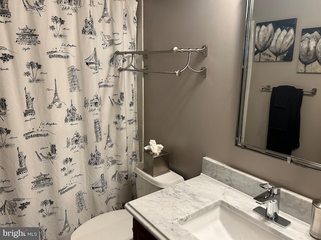 23294 Evening Primrose Sq, Brambleton, VA 20148 - bathroom featuring vanity, toilet, and curtained shower