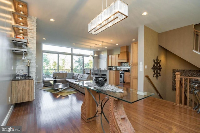 23294 Evening Primrose Sq, Brambleton, VA 20148 - dining area featuring dark wood-style flooring, baseboards, recessed lighting, and a chandelier