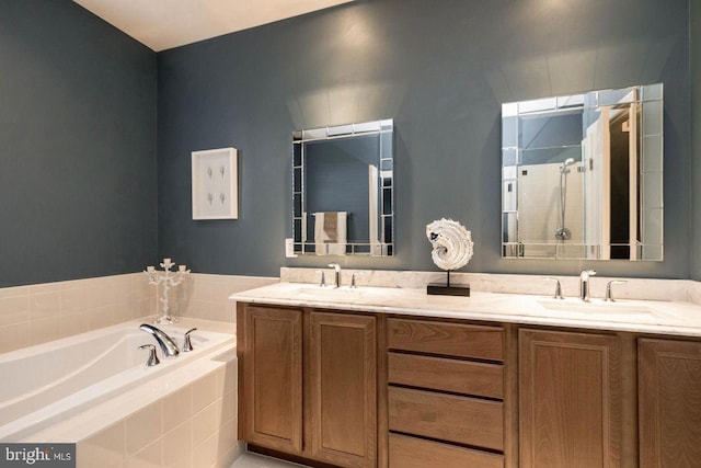 23294 Evening Primrose Sq, Brambleton, VA 20148 - bathroom with double vanity, a bath, and a stall shower