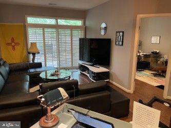 23294 Evening Primrose Sq, Brambleton, VA 20148 - living area with baseboards