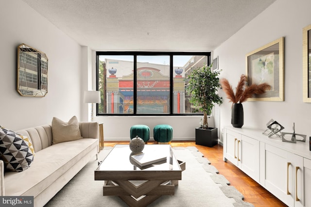 1301 20th St NW Unit 312, Washington, DC 20036 - living area with light wood-style flooring and a textured ceiling