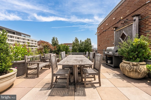 1301 20th St NW Unit 312, Washington, DC 20036 - view of patio / terrace featuring outdoor dining space and a grill