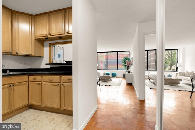1301 20th St NW Unit 312, Washington, DC 20036 - kitchen featuring open floor plan and dark countertops