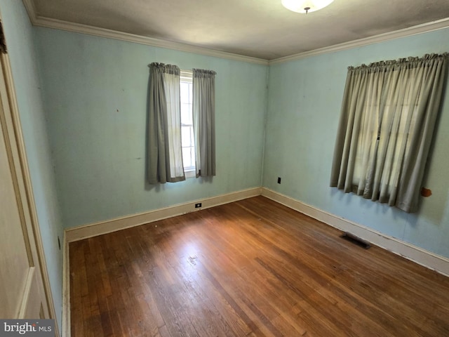 408 Dover St, Salisbury, MD 21804 - unfurnished room featuring dark wood-style flooring, ornamental molding, and baseboards