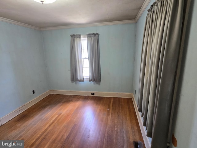408 Dover St, Salisbury, MD 21804 - empty room featuring wood finished floors, baseboards, and crown molding
