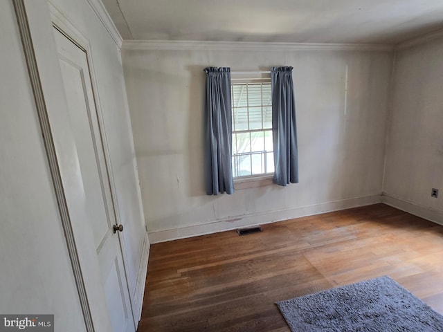 408 Dover St, Salisbury, MD 21804 - unfurnished room with wood finished floors, baseboards, and ornamental molding