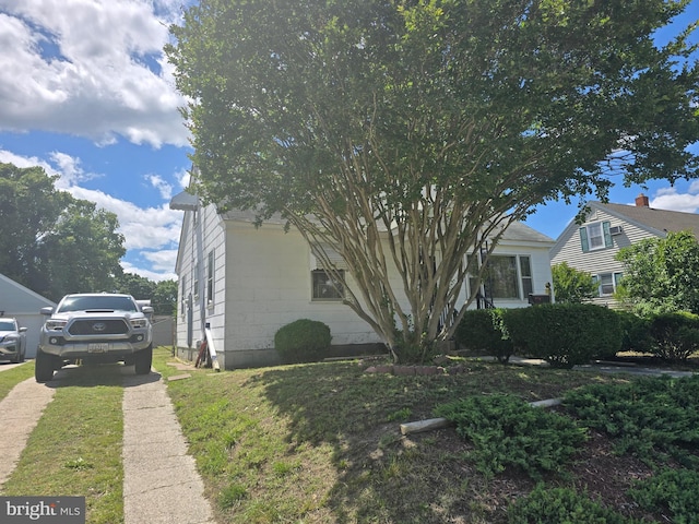 408 Dover St, Salisbury, MD 21804 - view of side of home with a yard and concrete block siding
