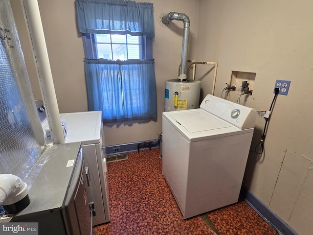 408 Dover St, Salisbury, MD 21804 - laundry area with water heater, independent washer and dryer, and baseboards