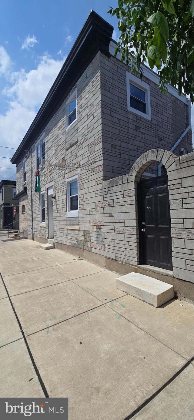 1447 S Chadwick St, Philadelphia, PA 19146 - view of property exterior with stone siding