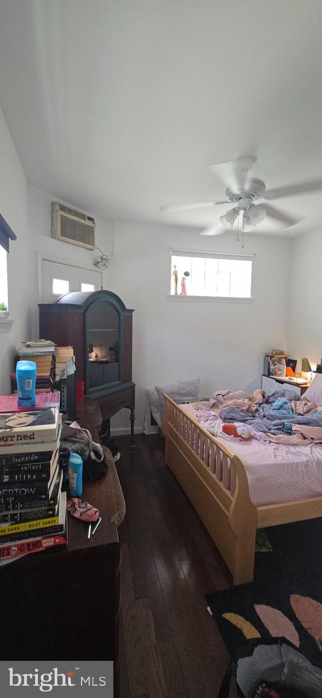 1447 S Chadwick St, Philadelphia, PA 19146 - bedroom with a wall mounted air conditioner, hardwood / wood-style flooring, and a ceiling fan