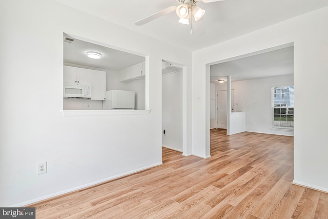 24 Helen Ct, Indian Head, MD 20640 - unfurnished room with a ceiling fan, light wood-style floors, and baseboards